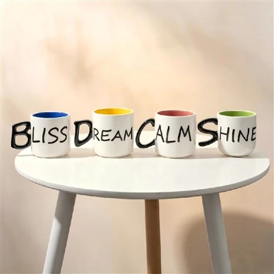 BLISS, DREAM, CALM und SHINE Tassenkollektion mit Alphabetgriff